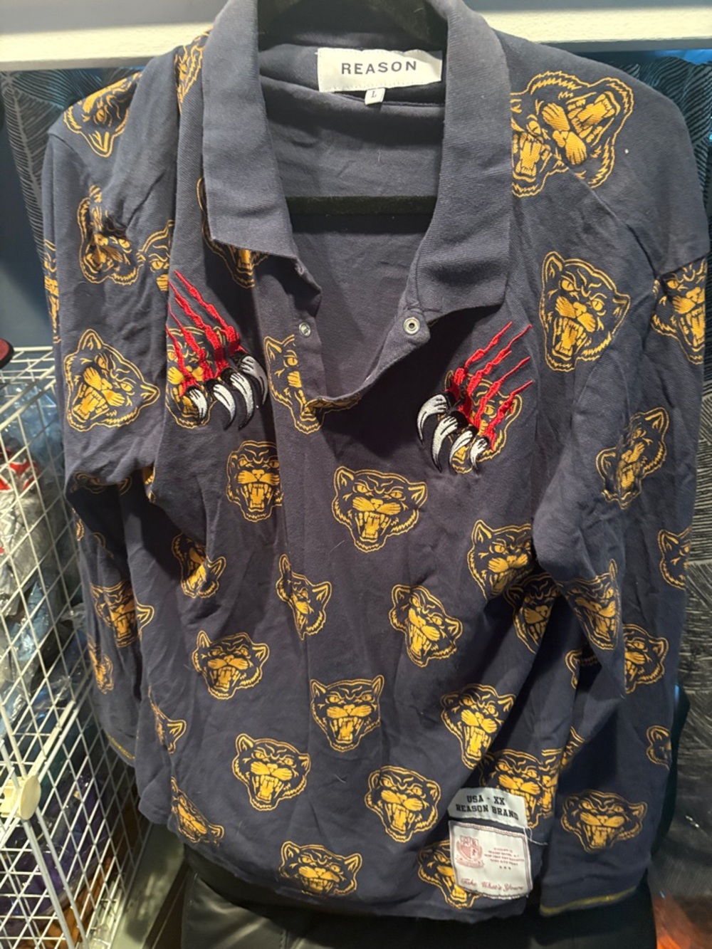 REASON Navy Polo with Gold Panther Faces and Red Claw Embroidery